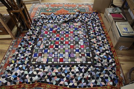 A 19th century patchwork silk quilt 200 x211cm